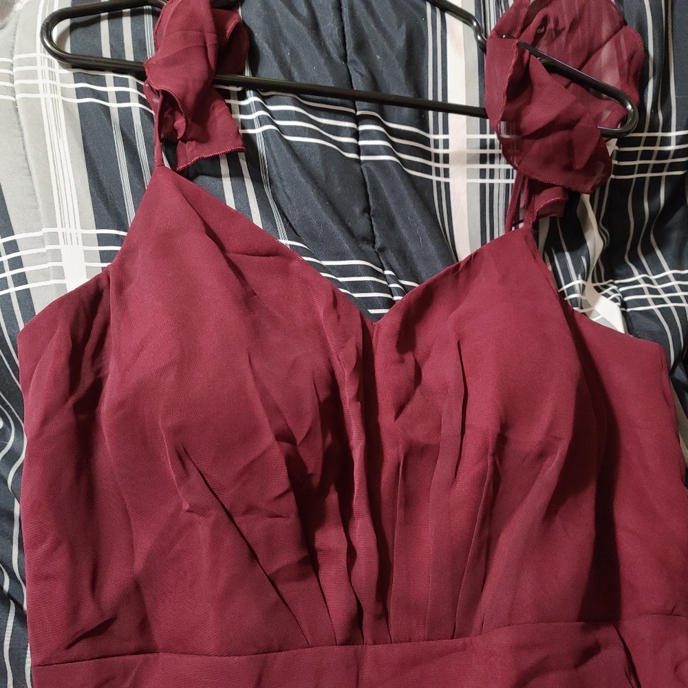 Brand new, never worn bridesmaid dress.